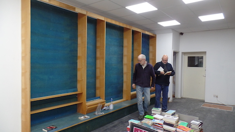 John and Peter contemplate the new shelves